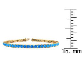 6 3/4 Carat Blue Topaz Tennis Bracelet In 14K Yellow Gold (12.1 G), 9 Inches By SuperJeweler