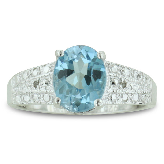 2 1/4 Carat Oval Shaped Blue Topaz & Diamond Ring in Sterling Silver