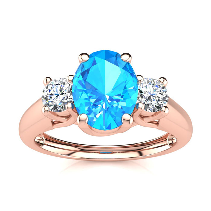 1 1/5 Carat Oval Shape Blue Topaz & Two Diamond Ring in 14K Rose Gold (2.2 g),  by SuperJeweler