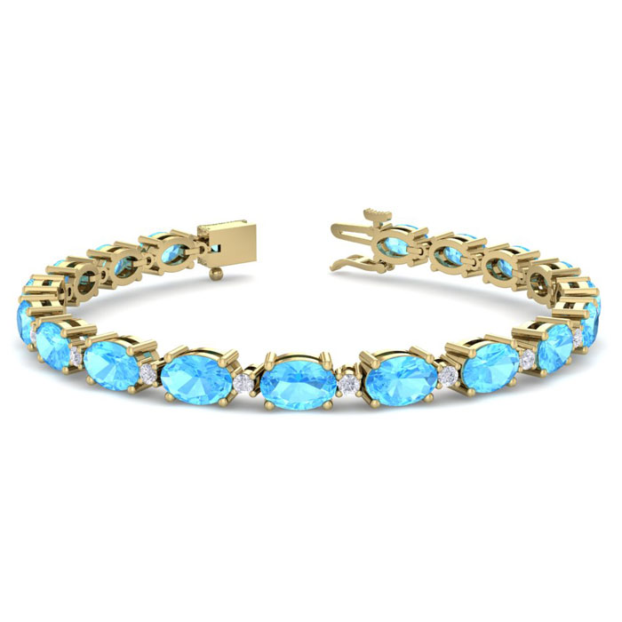 11 Carat Oval Shape Blue Topaz & Diamond Bracelet in 14K Yellow Gold (9.60 g), 7 Inches,  by SuperJeweler