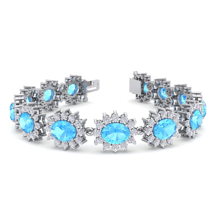 24 Carat Oval Shape Blue Topaz & Halo Diamond Bracelet in 14K Whi