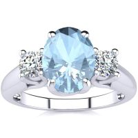 1 1/3 Carat Oval Shape Aquamarine and Two Diamond Ring In 14 Karat White Gold