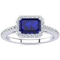 1 1/2 Carat Emerald Shape Sapphire and Halo Diamond Ring In 14 Karat White Gold