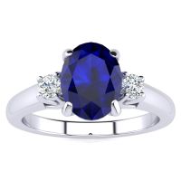 1 3/4 Carat Oval Shape Sapphire and Two Diamond Ring