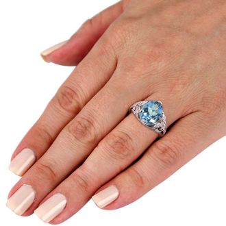 6ct Oval Blue Topaz and Diamond Ring Crafted In Solid 14K White Gold