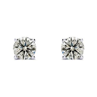 Nearly 3/4 Carat Diamond Stud Earrings In Platinum
