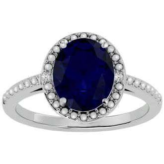 3 ½ Carat Sapphire and Diamond Halo Ring created in platinum overlay
