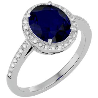3 ½ Carat Sapphire and Diamond Halo Ring created in platinum overlay
