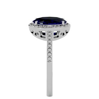3 ½ Carat Sapphire and Diamond Halo Ring created in platinum overlay
