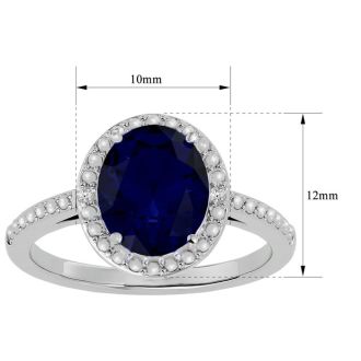 3 ½ Carat Sapphire and Diamond Halo Ring created in platinum overlay
