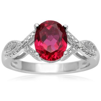2 1/2 Carat Oval Shape Ruby and Diamond Infinity Ring. Beautiful Deep Red Ruby In A Solid Mounting!