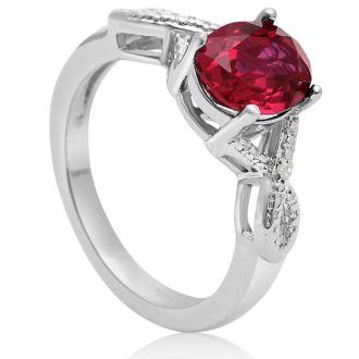 2 1/2 Carat Oval Shape Ruby and Diamond Infinity Ring. Beautiful Deep Red Ruby In A Solid Mounting!
