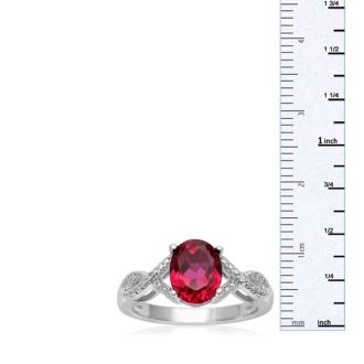 2 1/2 Carat Oval Shape Ruby and Diamond Infinity Ring. Beautiful Deep Red Ruby In A Solid Mounting!