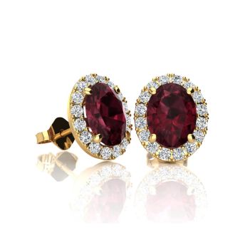 Garnet Earrings: Garnet Jewelry: 1 1/4 Carat Oval Shape Garnet and Halo Diamond Stud Earrings In 14 Karat Yellow Gold