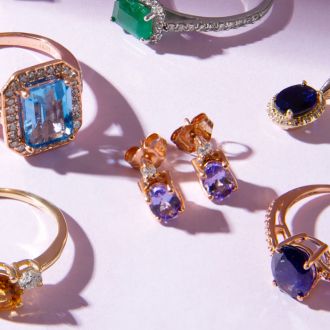 1 Carat Oval Shape Sapphire and Halo Diamond Necklace In 14 Karat Yellow Gold With 18 Inch Chain