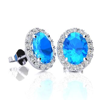 2 1/4 Carat Oval Shape Blue Topaz and Halo Diamond Stud Earrings In 14 Karat White Gold