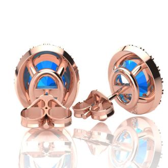2 1/4 Carat Oval Shape Blue Topaz and Halo Diamond Stud Earrings In 14 Karat Rose Gold