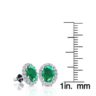 1 3/4 Carat Oval Shape Emerald and Halo Diamond Stud Earrings In 14 Karat White Gold