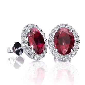 2 Carat Oval Shape Ruby and Halo Diamond Stud Earrings In 14 Karat White Gold