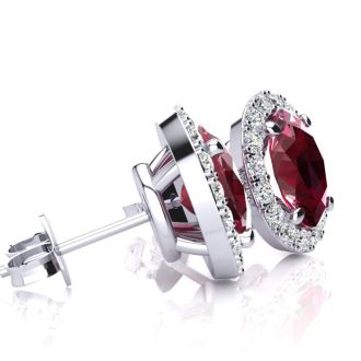 2 Carat Oval Shape Ruby and Halo Diamond Stud Earrings In 14 Karat White Gold