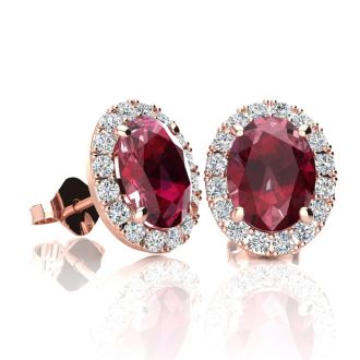 2 Carat Oval Shape Ruby and Halo Diamond Stud Earrings In 14 Karat Rose Gold