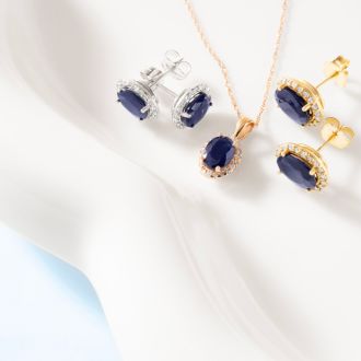 2 1/4 Carat Oval Shape Sapphire and Halo Diamond Stud Earrings In 14 Karat White Gold