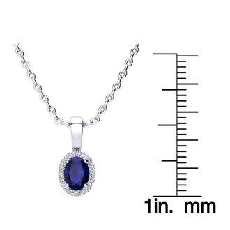 0.67 Carat Oval Shape Sapphire and Halo Diamond Necklace In 14 Karat White Gold With 18 Inch Chain
