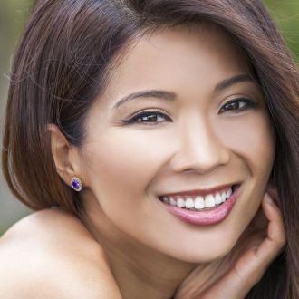 2.40 Carat Oval Shape Amethyst and Halo Diamond Stud Earrings In 14 Karat Yellow Gold