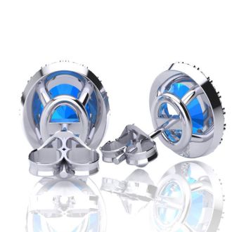 3 1/4 Carat Oval Shape Blue Topaz and Halo Diamond Stud Earrings In 14 Karat White Gold