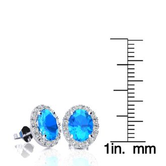 3 1/4 Carat Oval Shape Blue Topaz and Halo Diamond Stud Earrings In 14 Karat White Gold