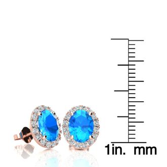 3 1/4 Carat Oval Shape Blue Topaz and Halo Diamond Stud Earrings In 14 Karat Rose Gold