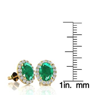 2 1/2 Carat Oval Shape Emerald and Halo Diamond Stud Earrings In 14 Karat Yellow Gold