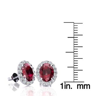 3.40 Carat Oval Shape Ruby and Halo Diamond Stud Earrings In 14 Karat White Gold