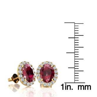 3.40 Carat Oval Shape Ruby and Halo Diamond Stud Earrings In 14 Karat Yellow Gold