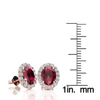 3.40 Carat Oval Shape Ruby and Halo Diamond Stud Earrings In 14 Karat Rose Gold