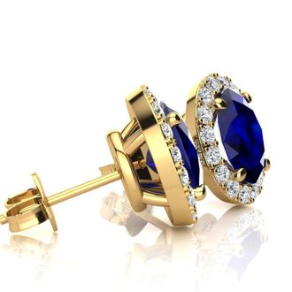 3 1/2 Carat Oval Shape Sapphire and Halo Diamond Stud Earrings In 14 Karat Yellow Gold