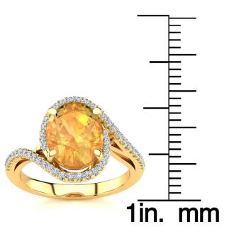 2 1/2 Carat Oval Shape Citrine and Halo Diamond Ring In 14 Karat Yellow Gold