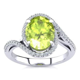 2 3/4 Carat Oval Shape Peridot and Halo Diamond Ring In 14 Karat White Gold