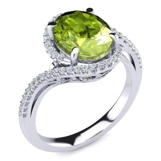 2 3/4 Carat Oval Shape Peridot and Halo Diamond Ring In 14 Karat White Gold