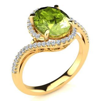 2 3/4 Carat Oval Shape Peridot and Halo Diamond Ring In 14 Karat Yellow Gold