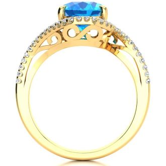 3 1/2 Carat Oval Shape Blue Topaz and Halo Diamond Ring In 14 Karat Yellow Gold