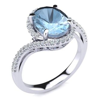 Aquamarine Ring: Aquamarine Jewelry: 2 1/2 Carat Oval Shape Aquamarine and Halo Diamond Ring In 14 Karat White Gold