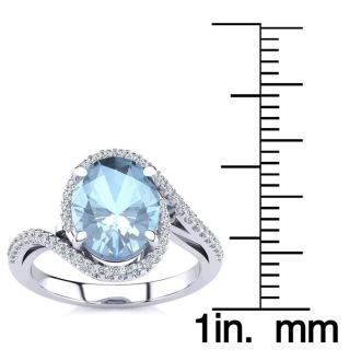 Aquamarine Ring: Aquamarine Jewelry: 2 1/2 Carat Oval Shape Aquamarine and Halo Diamond Ring In 14 Karat White Gold