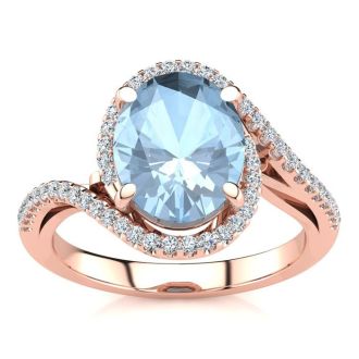 Aquamarine Ring: Aquamarine Jewelry: 2 1/2 Carat Oval Shape Aquamarine and Halo Diamond Ring In 14 Karat Rose Gold