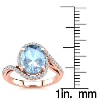 Aquamarine Ring: Aquamarine Jewelry: 2 1/2 Carat Oval Shape Aquamarine and Halo Diamond Ring In 14 Karat Rose Gold