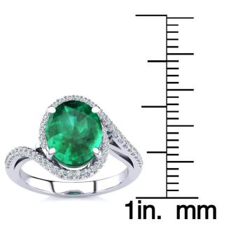 2 1/2 Carat Oval Shape Emerald and Halo Diamond Ring In 14 Karat White Gold
