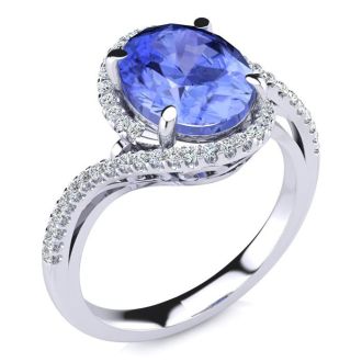 2 3/4 Carat Oval Shape Tanzanite and Halo Diamond Ring In 14 Karat White Gold