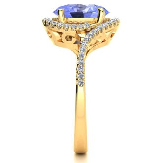 2 3/4 Carat Oval Shape Tanzanite and Halo Diamond Ring In 14 Karat Yellow Gold