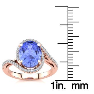 2 3/4 Carat Oval Shape Tanzanite and Halo Diamond Ring In 14 Karat Rose Gold