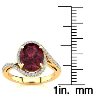 Garnet Ring: Garnet Jewelry: 3 1/3 Carat Oval Shape Garnet and Halo Diamond Ring In 14 Karat Yellow Gold